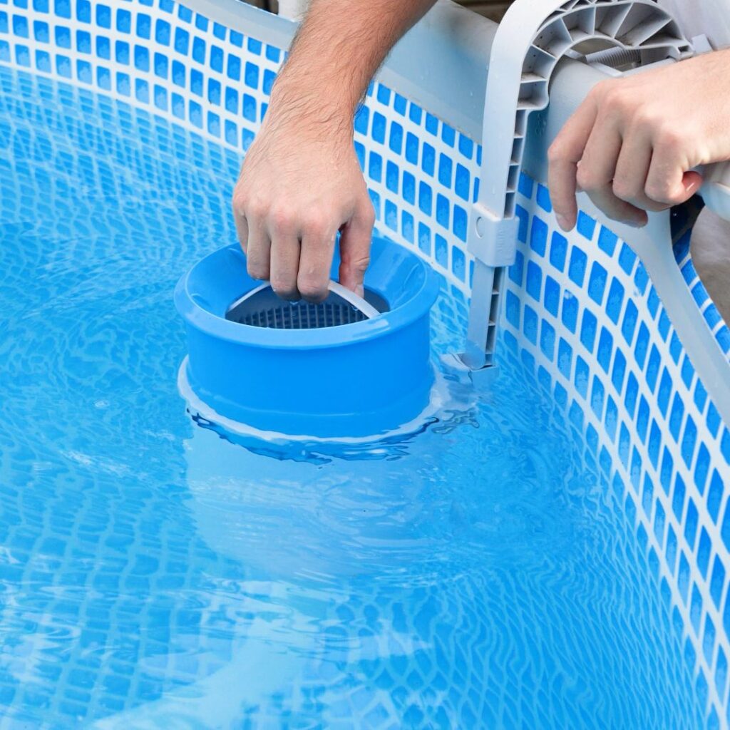 img of a pool being cleaned