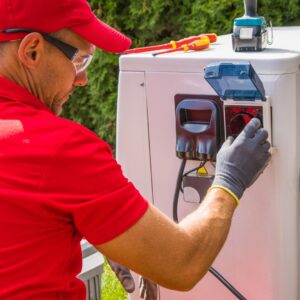 Person repairing a pool heater