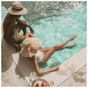 couple relaxing in a pool