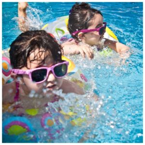 kids swimming in a clean pool