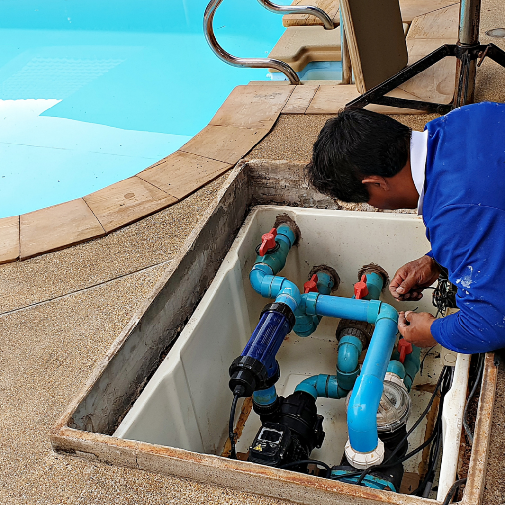Person looking at swimming pool equiptment